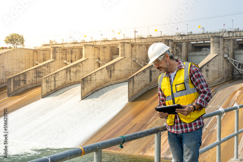 A Dam engineering doing his daily routine inspection work.