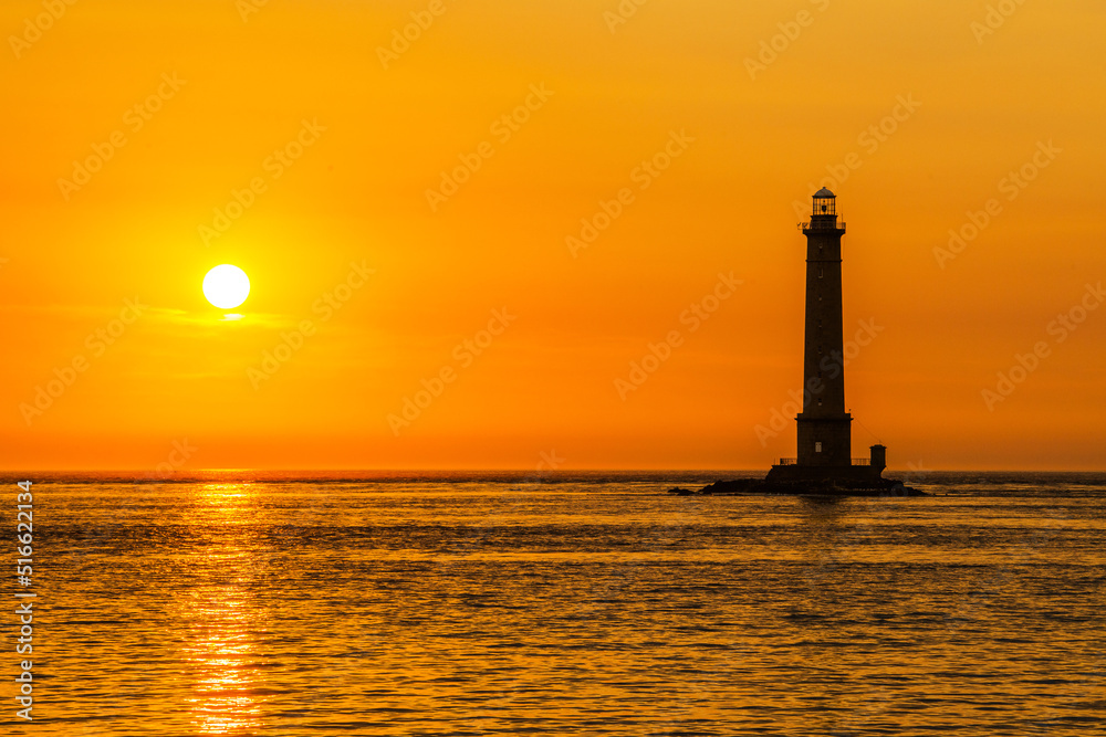 Coucher de soleil sur le phare de Goury, Manche, Normandie.