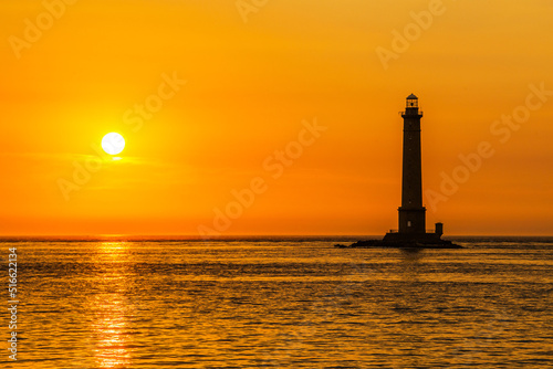 Obraz na płótnie Coucher de soleil sur le phare de Goury, Manche, Normandie. w salonie
