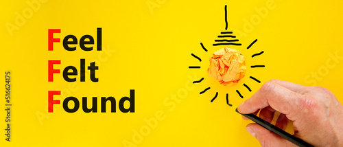FFF feel felt found technique symbol. Concept words FFF feel felt found on yellow paper on beautiful yellow background. Psychologist hand. Psychological feel felt found technique concept. Copy space