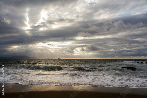 Sunset at Azkorri beach in the coast of Biscay  Basque Country  north of Spain. 