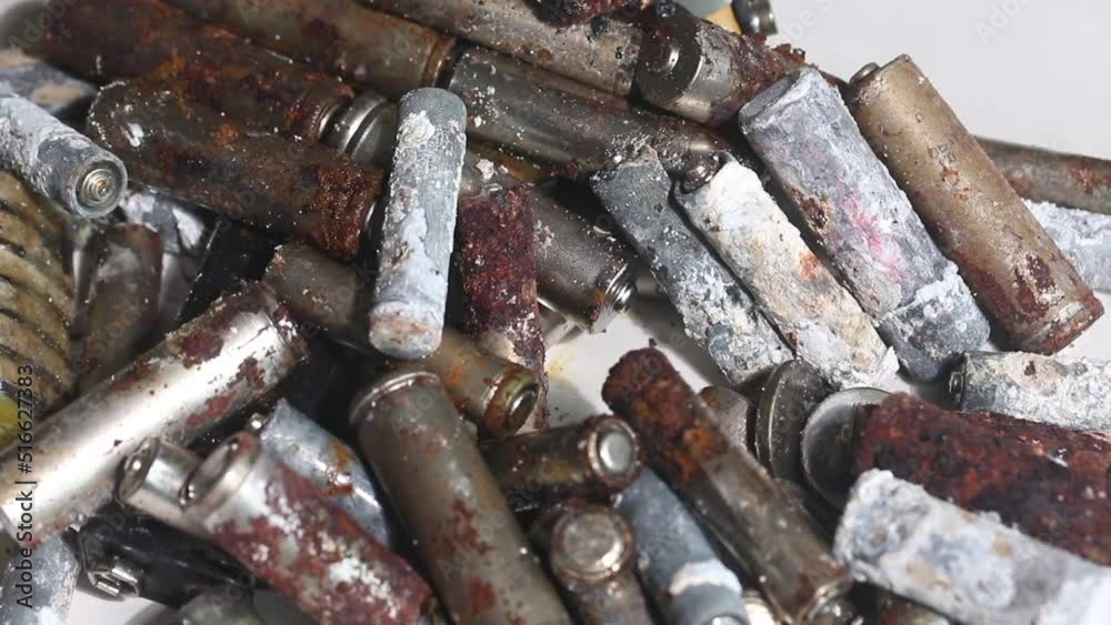 Batteries are corroded. With traces of chemical oxidation. Close-up. Batteries are corroded. With traces of chemical oxidation. Close-up.