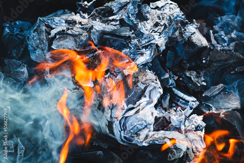 Background with burning paper and coal.
