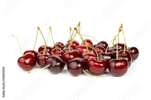 Juicy summer fruits, red cherries on a white background.