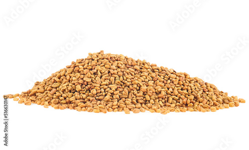 Pile of fenugreek seeds spice isolated on a white background. Methi Dana. photo