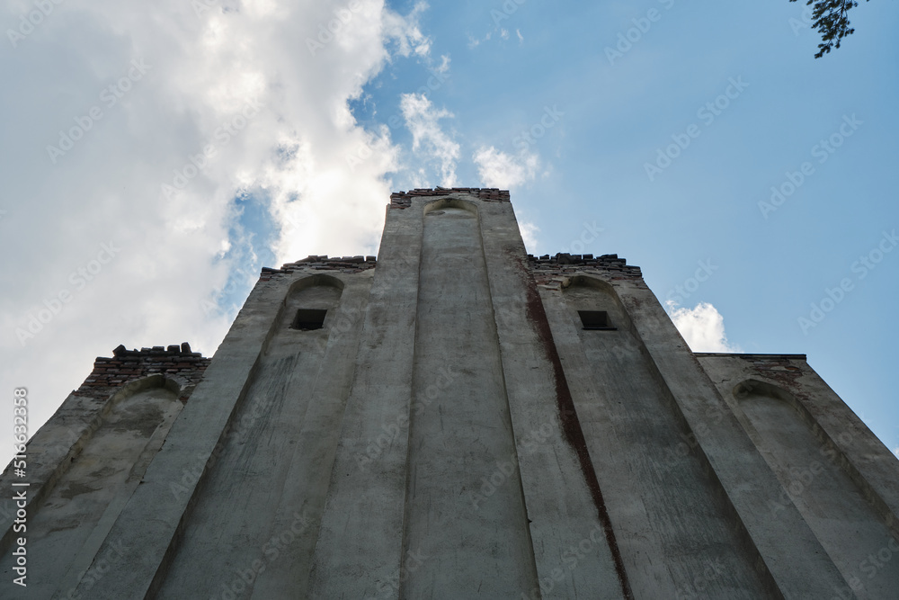 Old abandoned Finnish temple. Lutheran Church in Lumivaara, Republic of Karelia. Popular tourist destination in Russia. Outside view of the rear wall of the building.