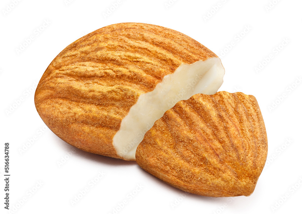 Single delicious almond broken in half, isolated on white background Single delicious almond broken in half, isolated on white background