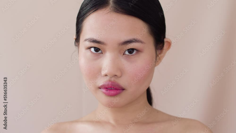 Beautiful Asian Woman With Posing In Studio.
Beautiful Asian Woman With Posing In Studio.