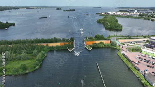 Aqueduct Veluwemeer near Harderwijk transport asphalt motorway road for traffic crossing underneath a waterway river lake infrastructure in the Netherlands. Holland photo