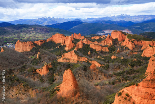 Panoramic view of the landscape of Las Medulas with snowy mountains in the background. Ancient Roman gold mines. Heritage of humanity by unesco. Spain