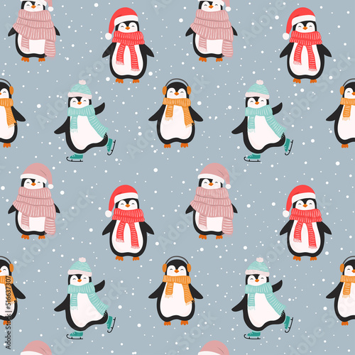 Christmas seamless pattern with cute cartoon penguins.