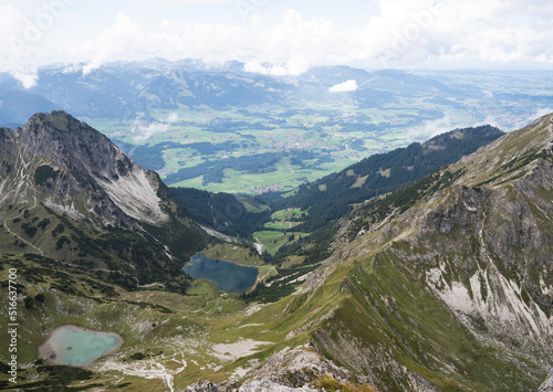 View over two romantic alpine lakes from a ridge