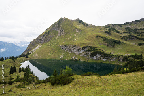 Romantic lake under a mountain in the Alps II