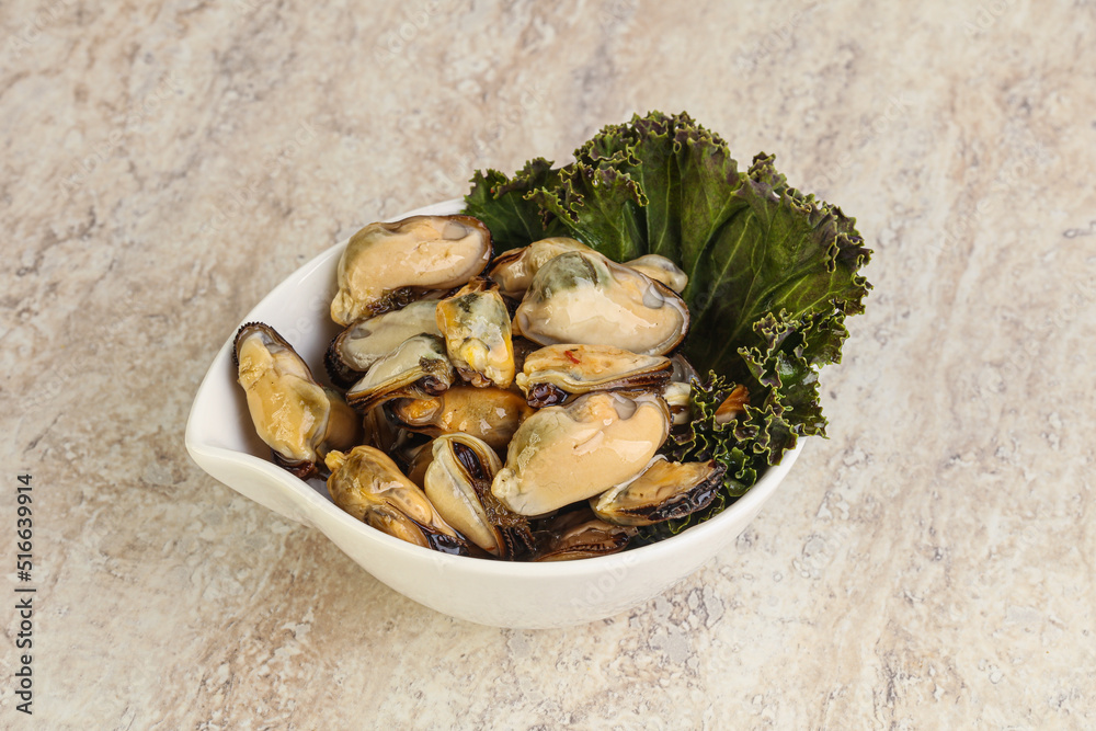 Tasty marinated mussels in the bowl Tasty marinated mussels in the bowl
