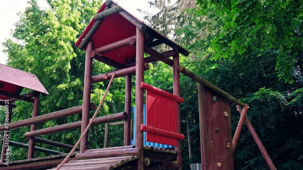 Empty Wooden Playground Castle with Bridge Rope and Climbing Wall Empty Wooden Playground Castle with Bridge Rope and Climbing Wall