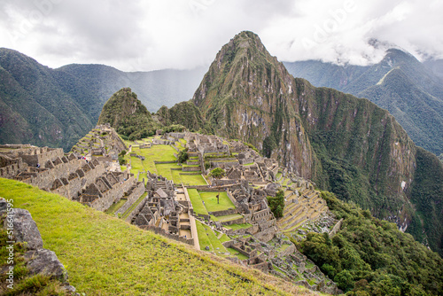 General view of Inca Citadel called Machupichu built of stones in the mountain, cloudy day, Peru