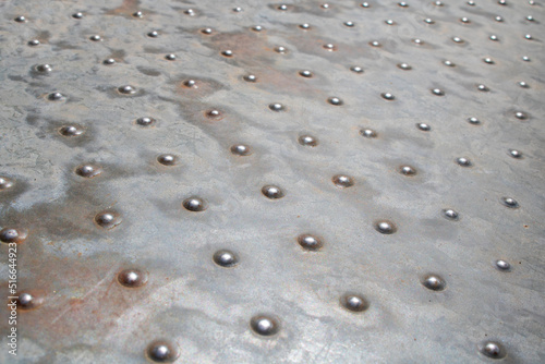 industrial Round Stainless Steel Embossed Sheet metal surface in perspective