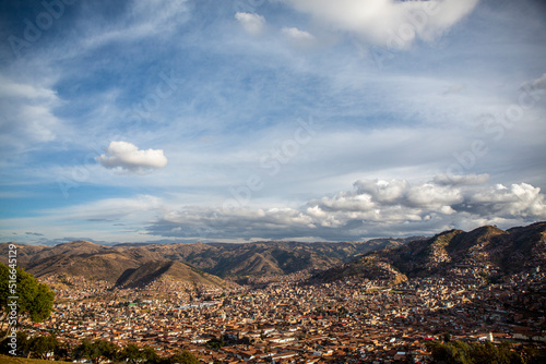Aerial view of the city of Cusco in a cloudy sky day, Peru