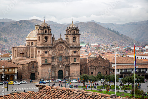 View of the cathedral of Cusco in its main square and tiled roofs of the place, Peru photo