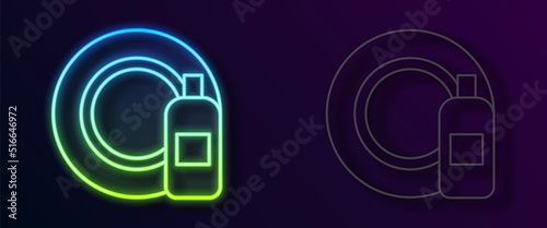 Glowing neon line Dishwashing liquid bottle and plate icon isolated on black background. Liquid detergent for washing dishes. Vector