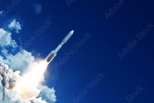 Fototapeta Naklejka Na Ścianę i Meble -  Rocket launch into space. Elements of this image furnished by NASA
