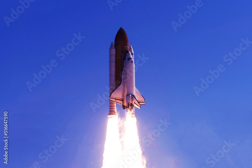 Fototapeta Naklejka Na Ścianę i Meble -  Rocket launch into space. Elements of this image furnished by NASA