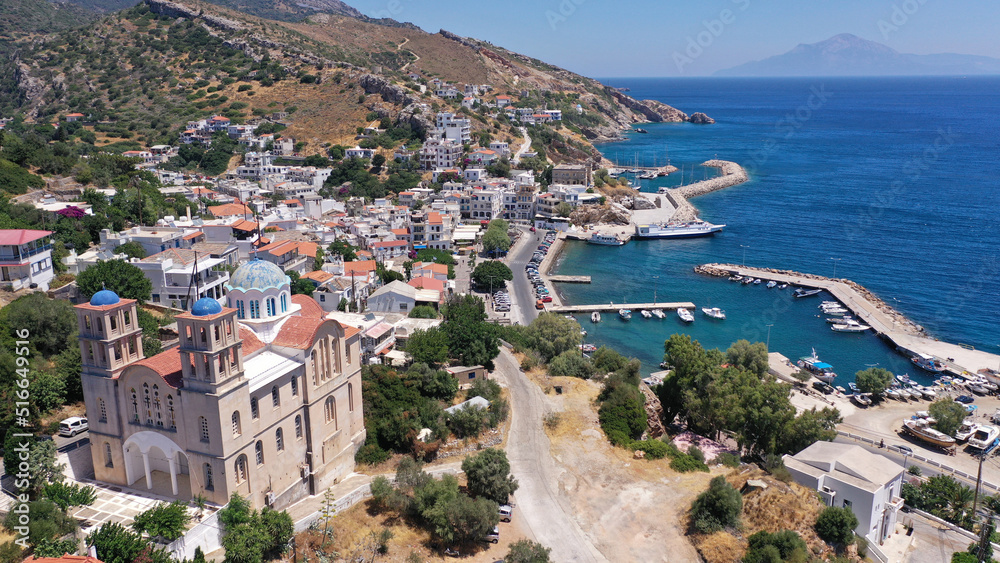 Aerial drone photo of Agios Kirykos, famous picturesque port and capital of Ikaria island, Northeast aegean, Greece Aerial drone photo of Agios Kirykos, famous picturesque port and capital of Ikaria island, Northeast aegean, Greece