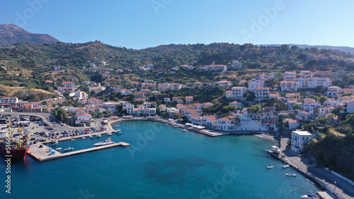 Fototapeta Naklejka Na Ścianę i Meble -  Aerial drone photo of famous small picturesque port of Evdilos in island of Ikaria, Northeast aegean, Greece