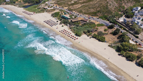 Aerial drone photo of famous bay and sandy beach of Mesakti, popular for surfing sports, Ikaria island, Northeast Aegean, Greece photo