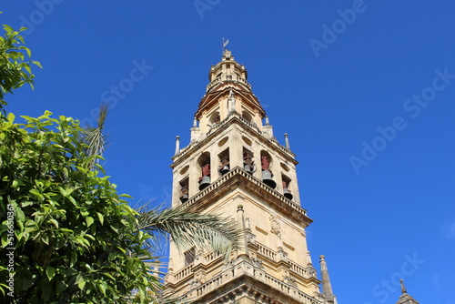 Tower of the Mezquita Cathedral of Cordoba on a bright sunny day, Spain.