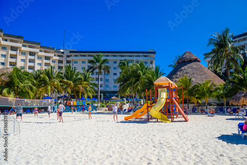Playground for kinds near hotel on the sandy beach on a sunny day in Cancun, Yukatan, Mexico photo
