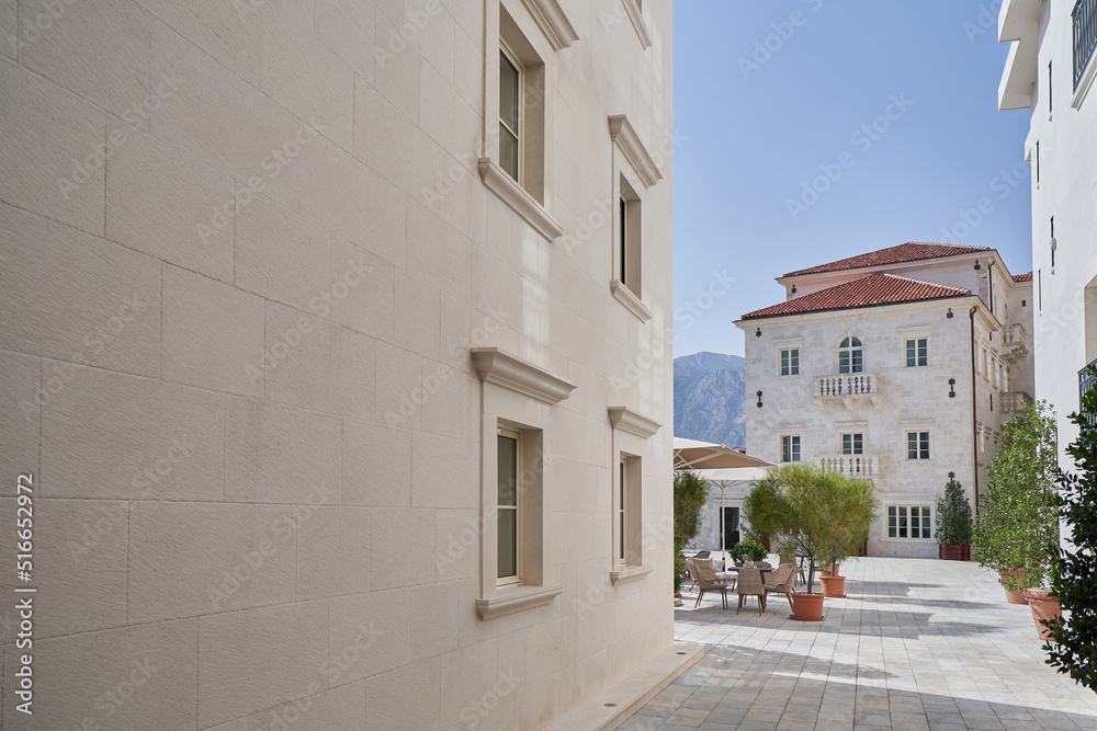 Buildings with stone beige walls, elegant architecture