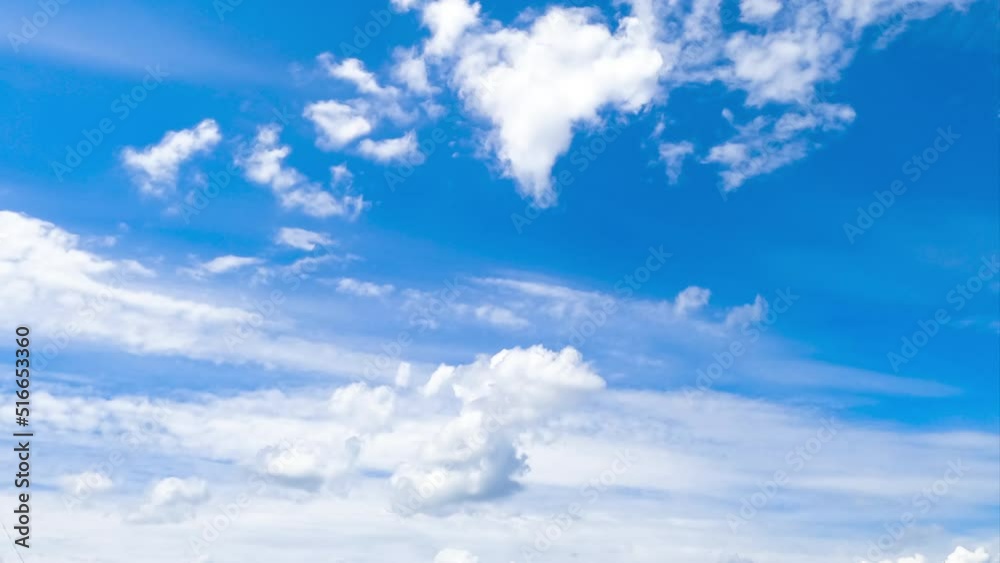Heavenly beautiful blue skies with white clouds floating by. Cumulus and spindrift clouds transforming in the atmosphere. Timelapse. Heavenly beautiful blue skies with white clouds floating by. Cumulus and spindrift clouds transforming in the atmosphere. Timelapse.