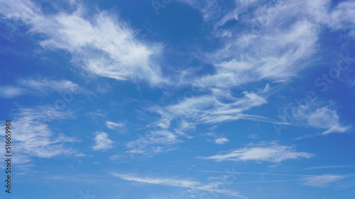 Fototapeta Naklejka Na Ścianę i Meble -  WIspy clouds and blue sky suitable for background use or sky substitution