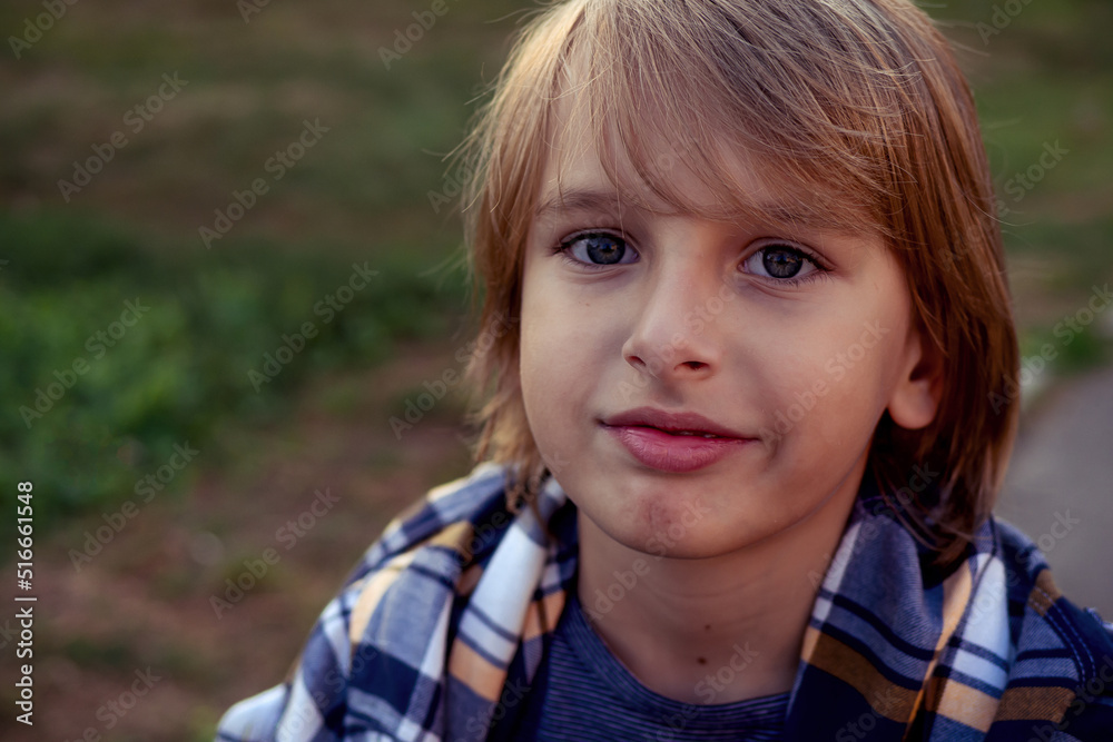 Teenger blonde boy outdoor park lifestyle portrait Teenger blonde boy outdoor park lifestyle portrait