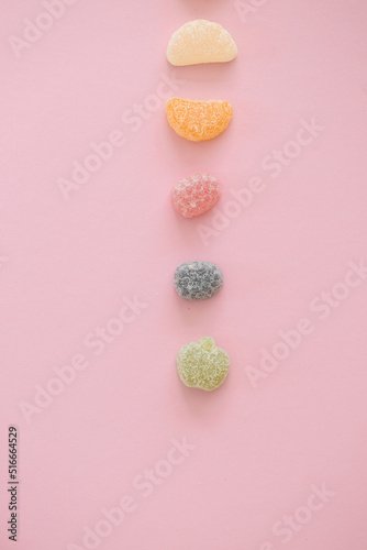 Italian jelly fruit sweets on pink background