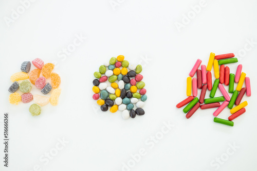 Fototapeta Naklejka Na Ścianę i Meble -  many different candies, sweets on white background