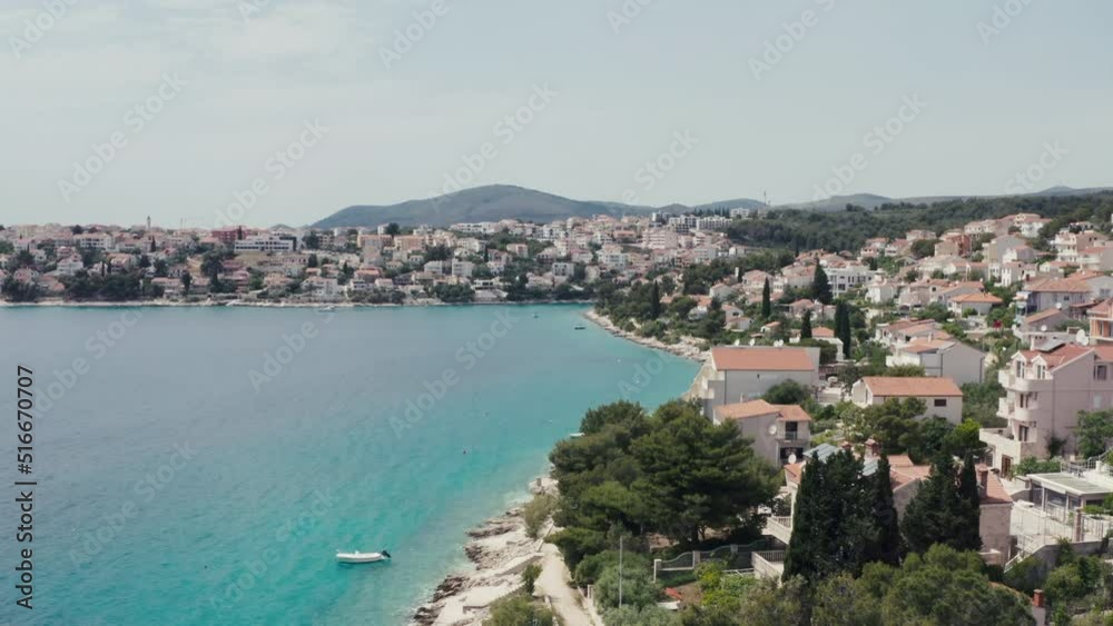 Aerial top view Croatia coast. A town on an island on the Adriatic coast with houses with red roofs, beaches and tourist places. Aerial top view Croatia coast. A town on an island on the Adriatic coast with houses with red roofs, beaches and tourist places.