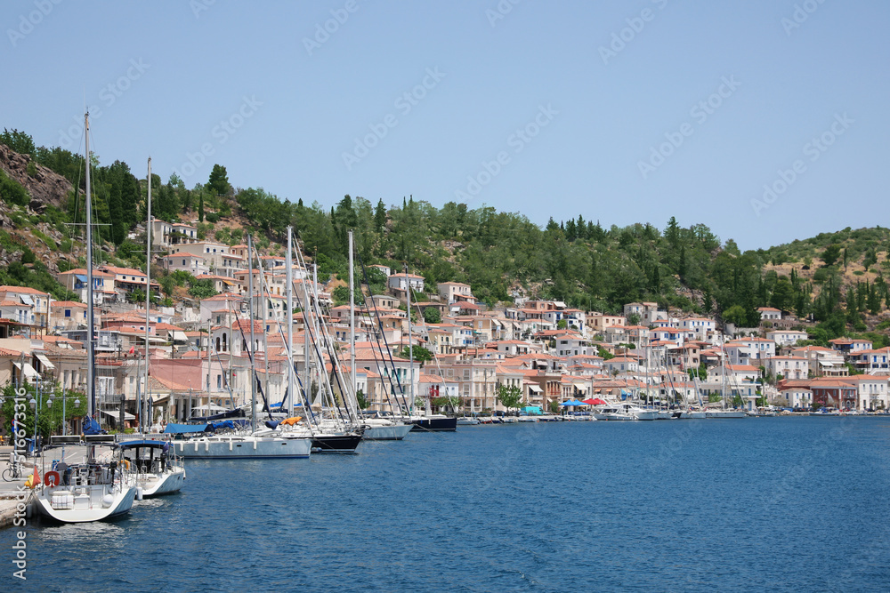 Beautiful view of coastal city with boats on sunny day Beautiful view of coastal city with boats on sunny day