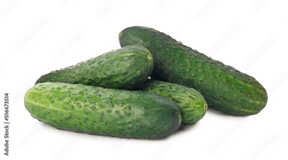 Whole fresh green cucumbers on white background Whole fresh green cucumbers on white background