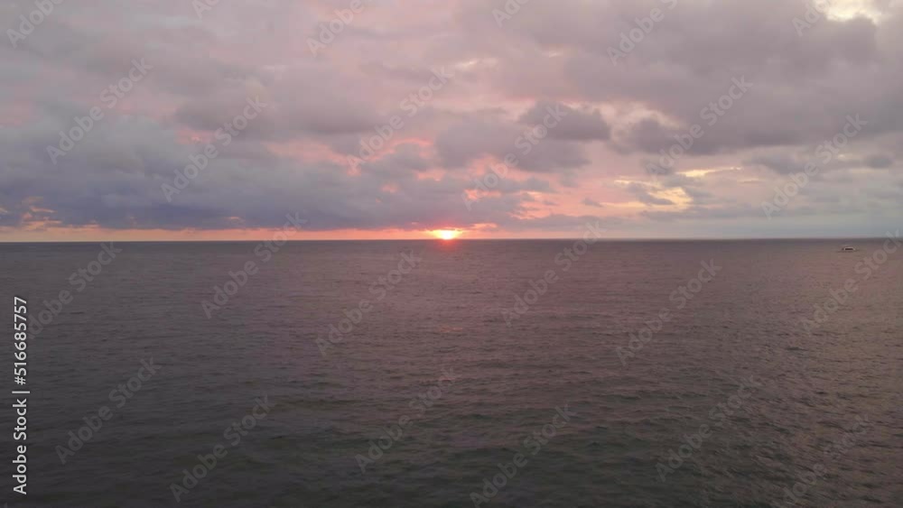 beautiful organge sunset over the pacific ocean at playa la vaca in costa rica beautiful organge sunset over the pacific ocean at playa la vaca in costa rica