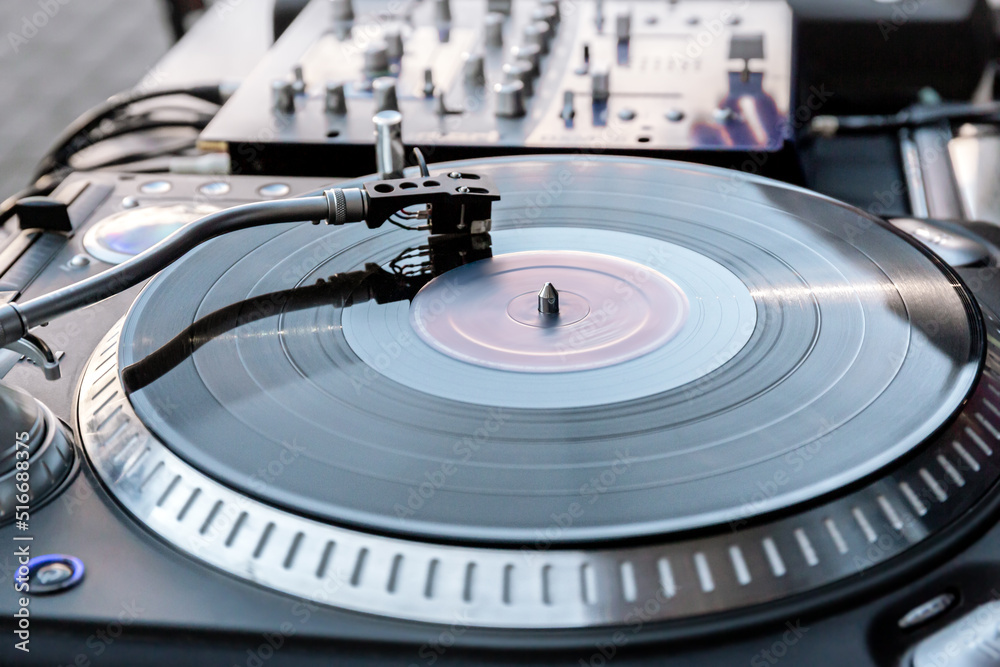 turntable vinyl record player. analog audio equipment for professional disc jockey. turntable vinyl record player. analog audio equipment for professional disc jockey.