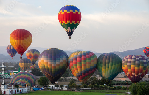 Colorful Hot Air Balloons Flying Over Ancient Pyramid of Teotihuacan, Mexico