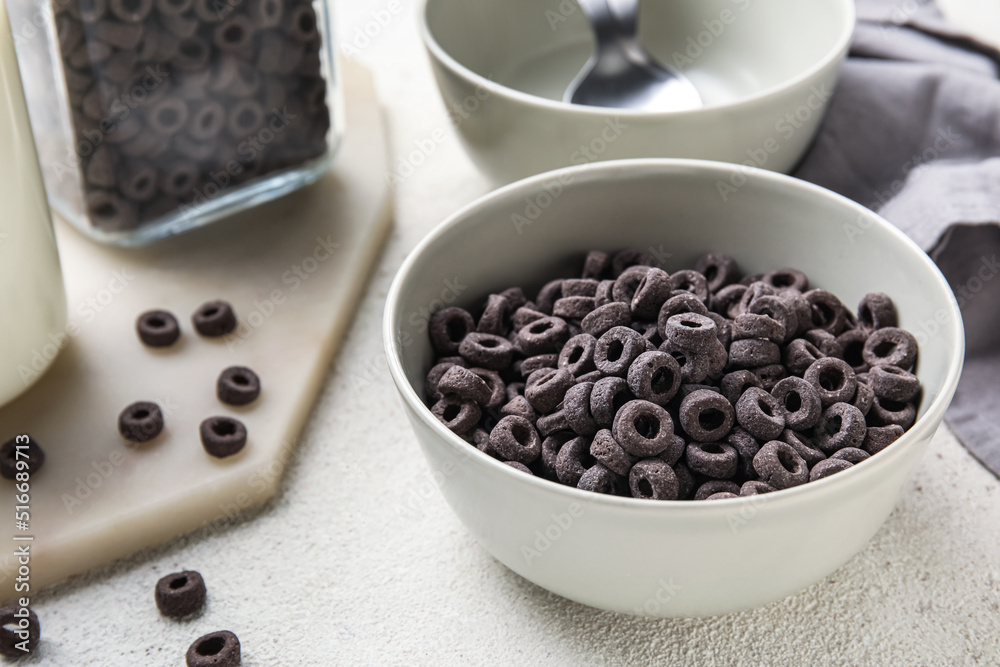 Bowl of black cereal rings on table Bowl of black cereal rings on table
