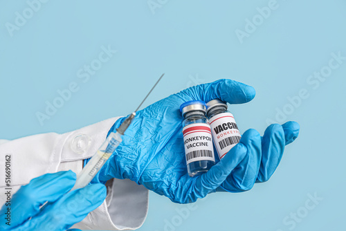 Hands of doctor with monkey...