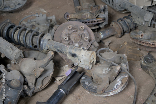Brake pads and other used car parts as garbage,