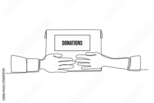 Photos Single one line drawing Volunteer giving a donate box to the Recipient