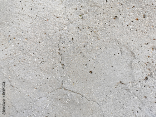 Unfinished cement wall texture background. Rough texture of concrete wall. 