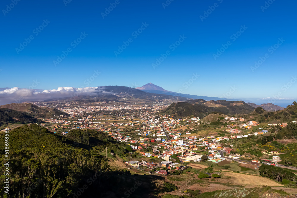 Panoramic view from the viewing platform Mirador de Jardina on a mountain village near San Cristobal de La Laguna, northeastern Tenerife, Canary Islands, Spain, Europe, EU. Volcano Teide in the back