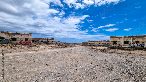 Panoramic view on the abandoned leper village of Sanatorio de Abona near Abades beach, east coast Tenerife Spain. Pueblo fantasma de Abades, an unnfinished project of leprosy hospital. Ghost town